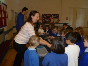 Diane Turner shows the meteorites to pupils at Pendragon School